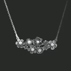 Silver chain with flowers and pearls. Necklaces for women.